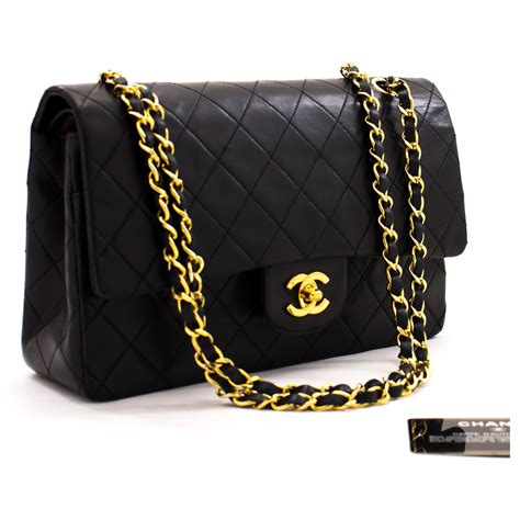 black on black chanel flap bag|Black Chanel leather shoulder bag.